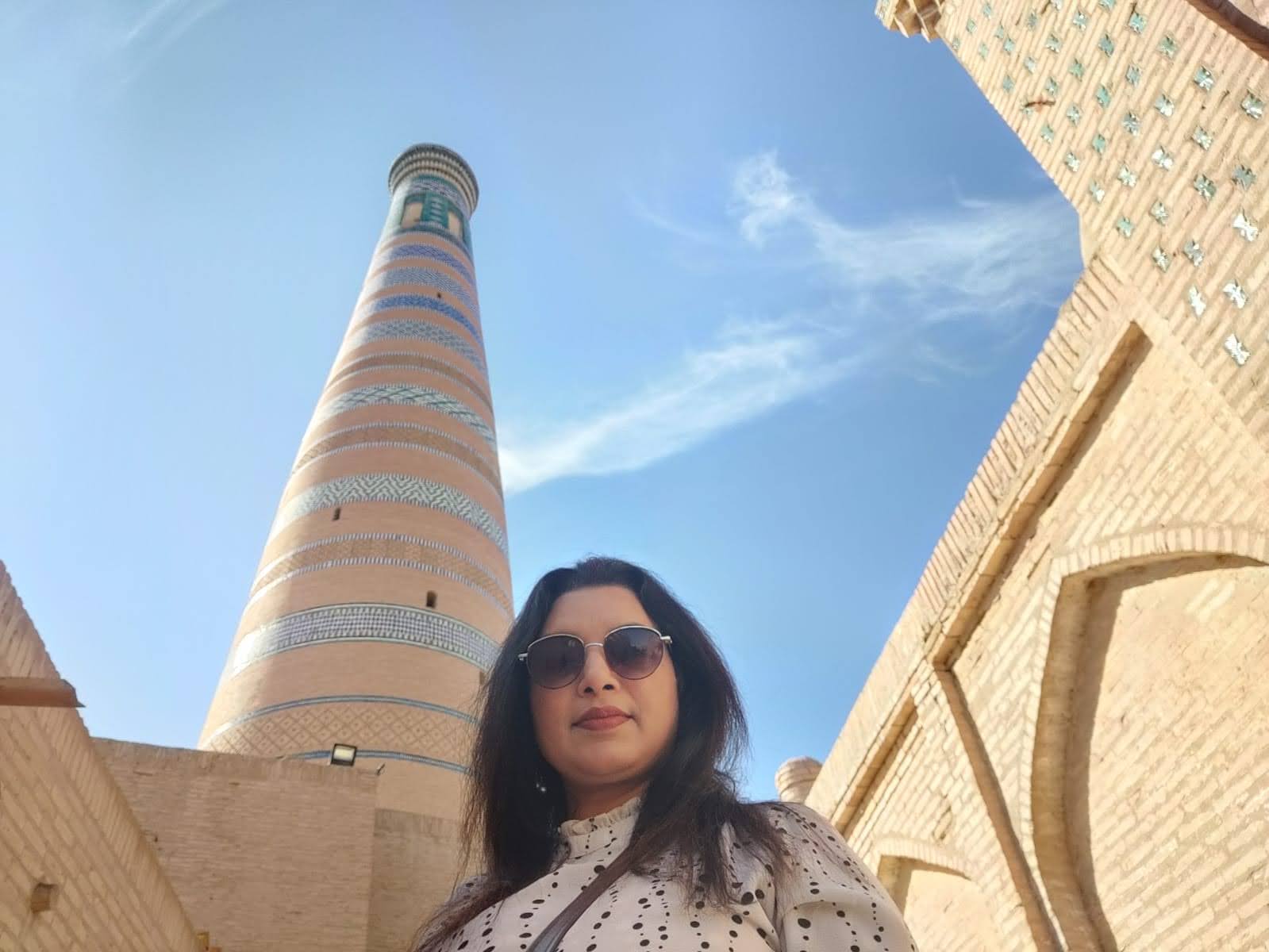 The tall, elegant Islam Khodja Minaret with turquoise bands