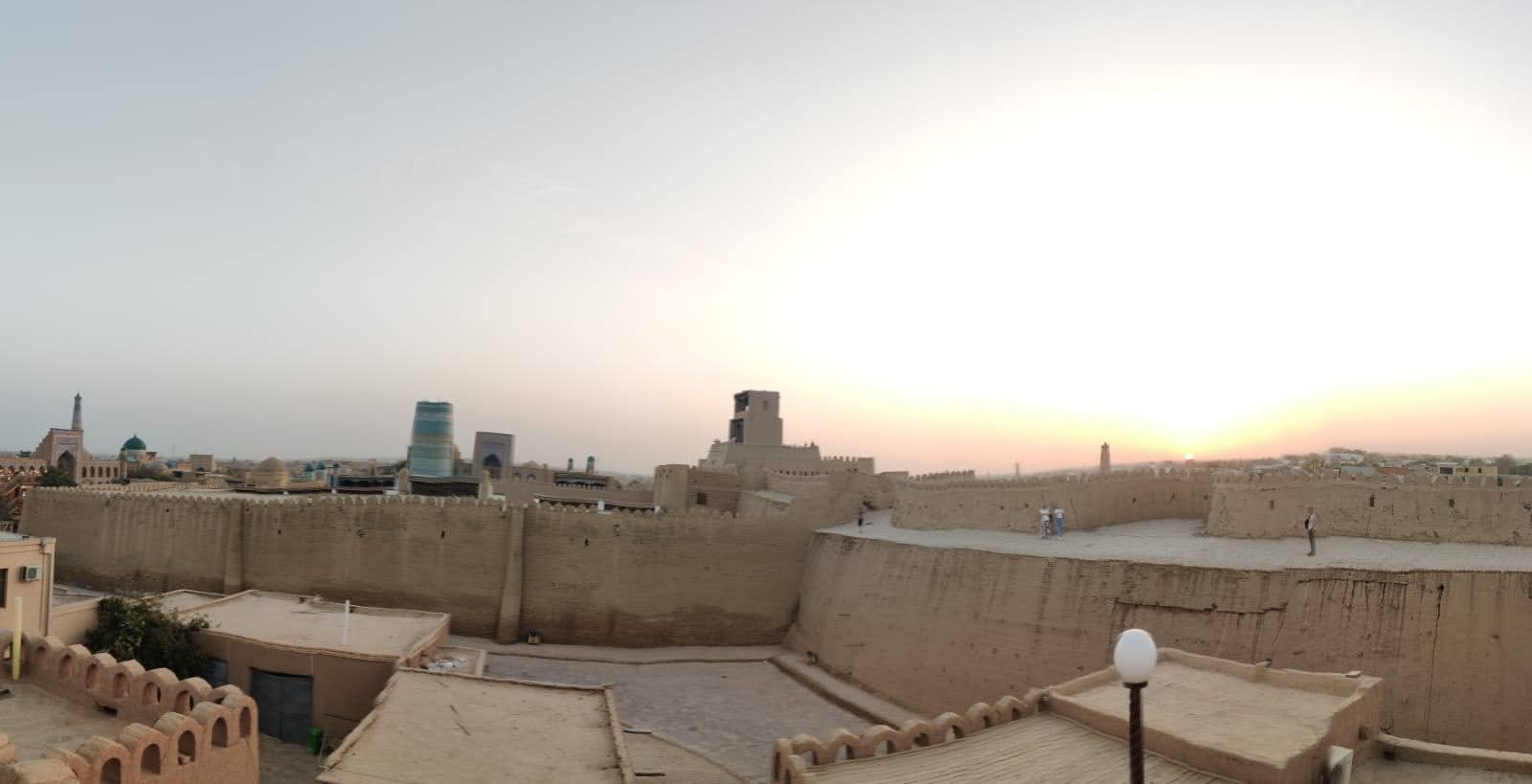Ancient city gates of Khiva under a clear blue sky