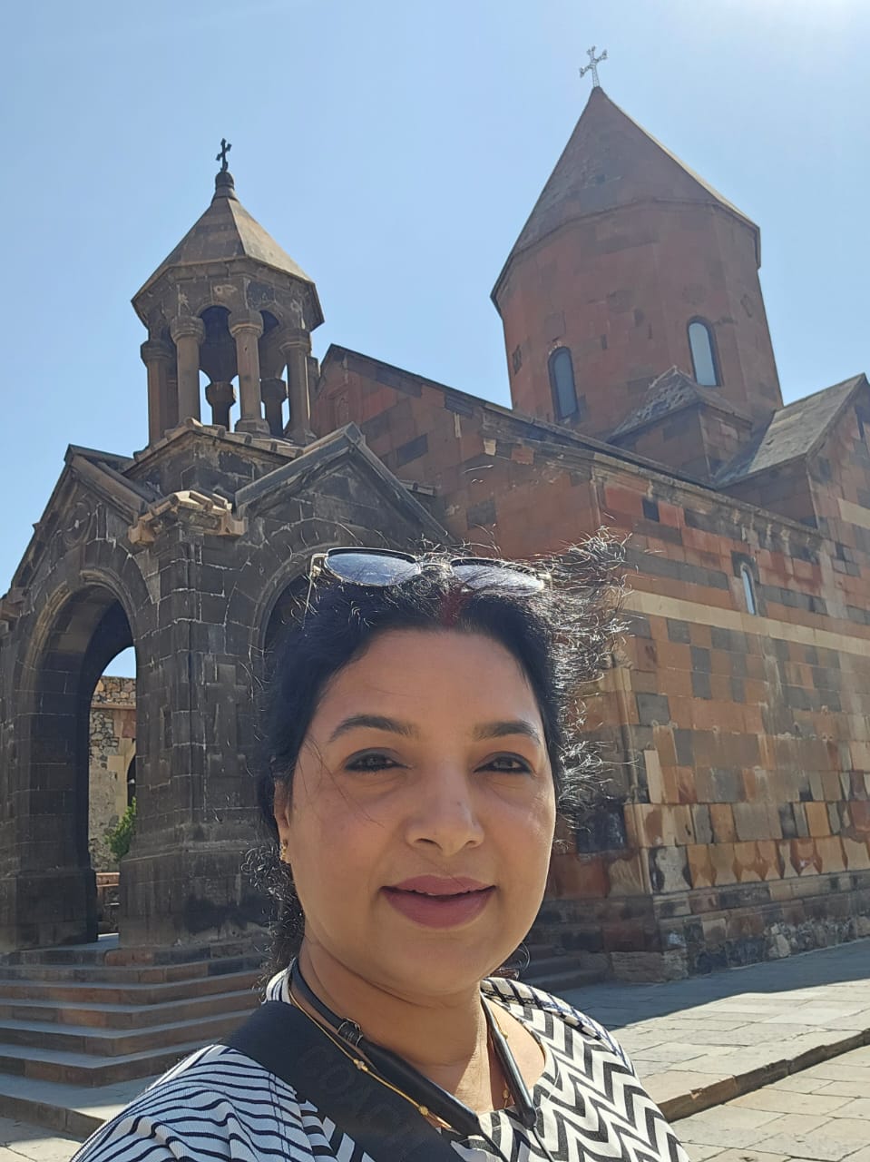 Explorers taking a photo with the historic Khor Virap monastery in the background