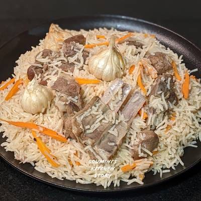 Dining in Shakhrisabz and serving delicious Uzbek Plov