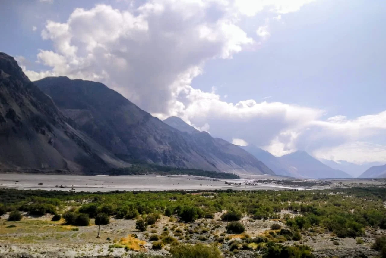 A hilltop view of Diskit Monastery, showing its spectacular integration with the mountain