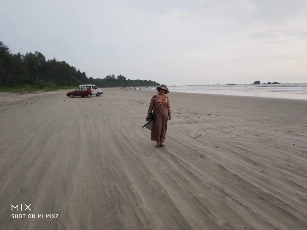Wide firm sand shoreline at Muzhappilangad Drive-In Beach