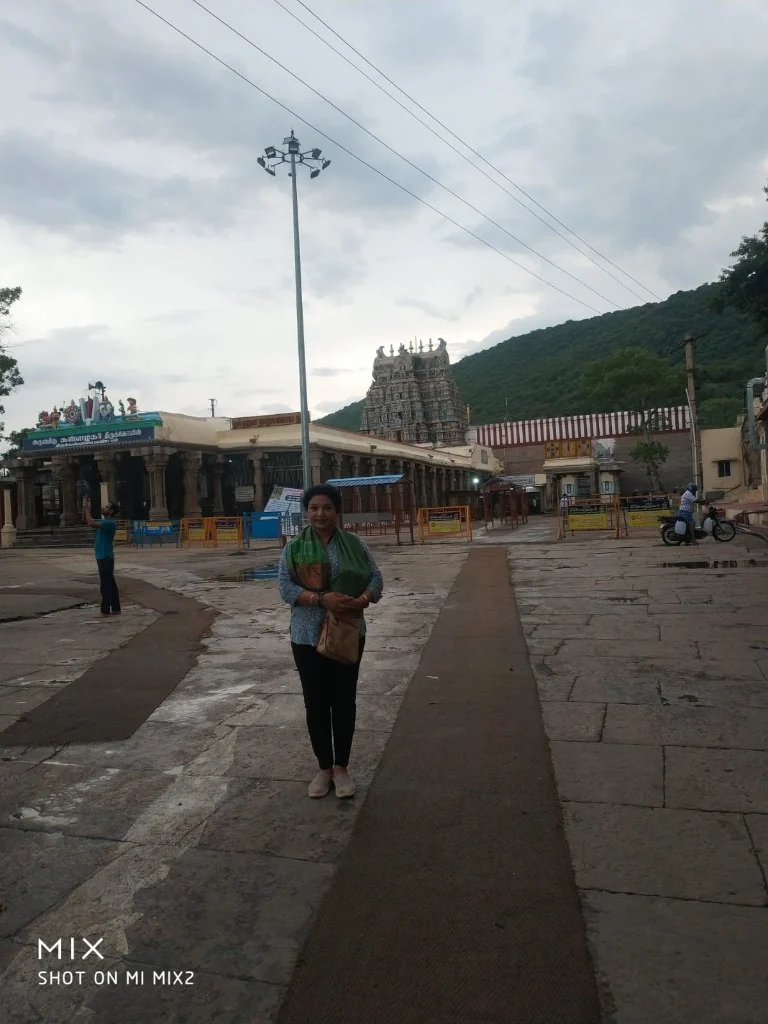 Arulmigu Subramaniyaswamy Temple at Thirupparankundram set against the rocky hill backdrop