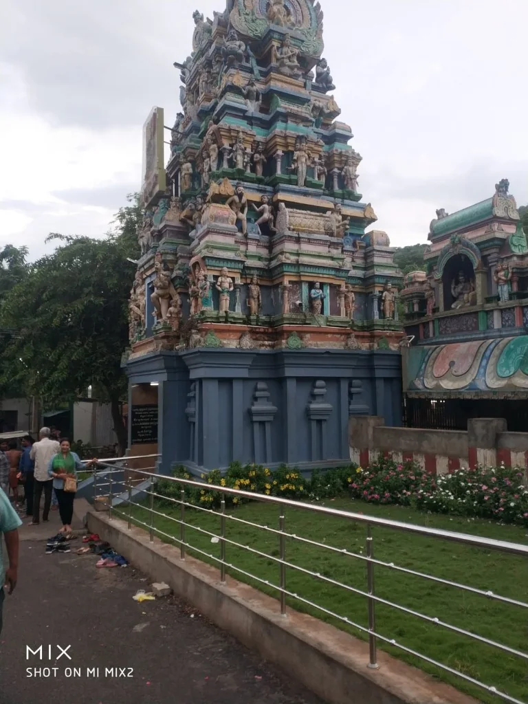Sculpted blue gopuram shrine at Thirupparankundram Murugan Temple