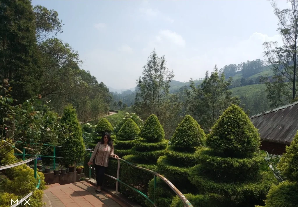 Manicured gardens & mountain vistas at KFDC Floriculture Centre