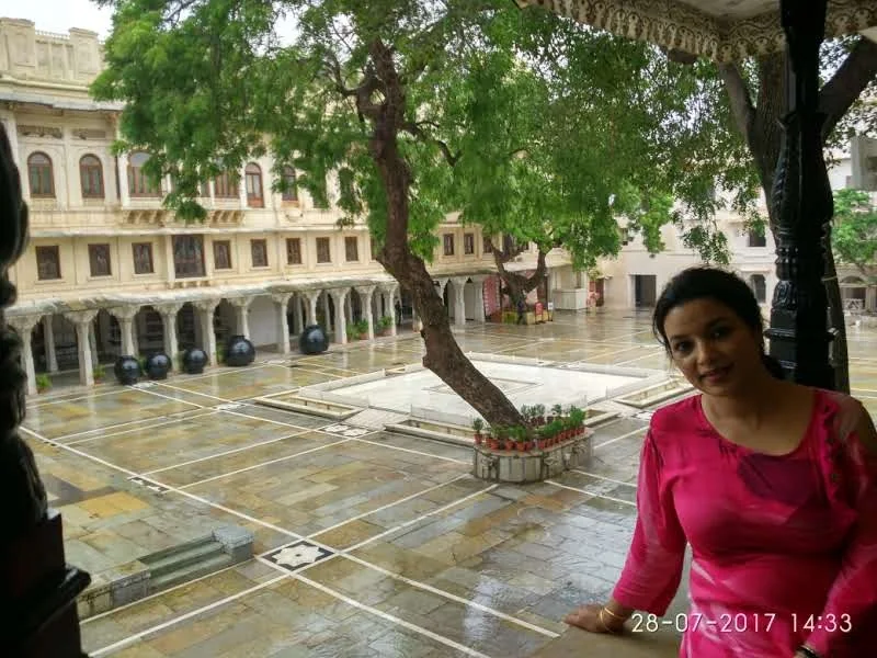 Shaded garden courtyard and marble pillars of Badi Mahal within the City Palace of Udaipur, Rajasthan
